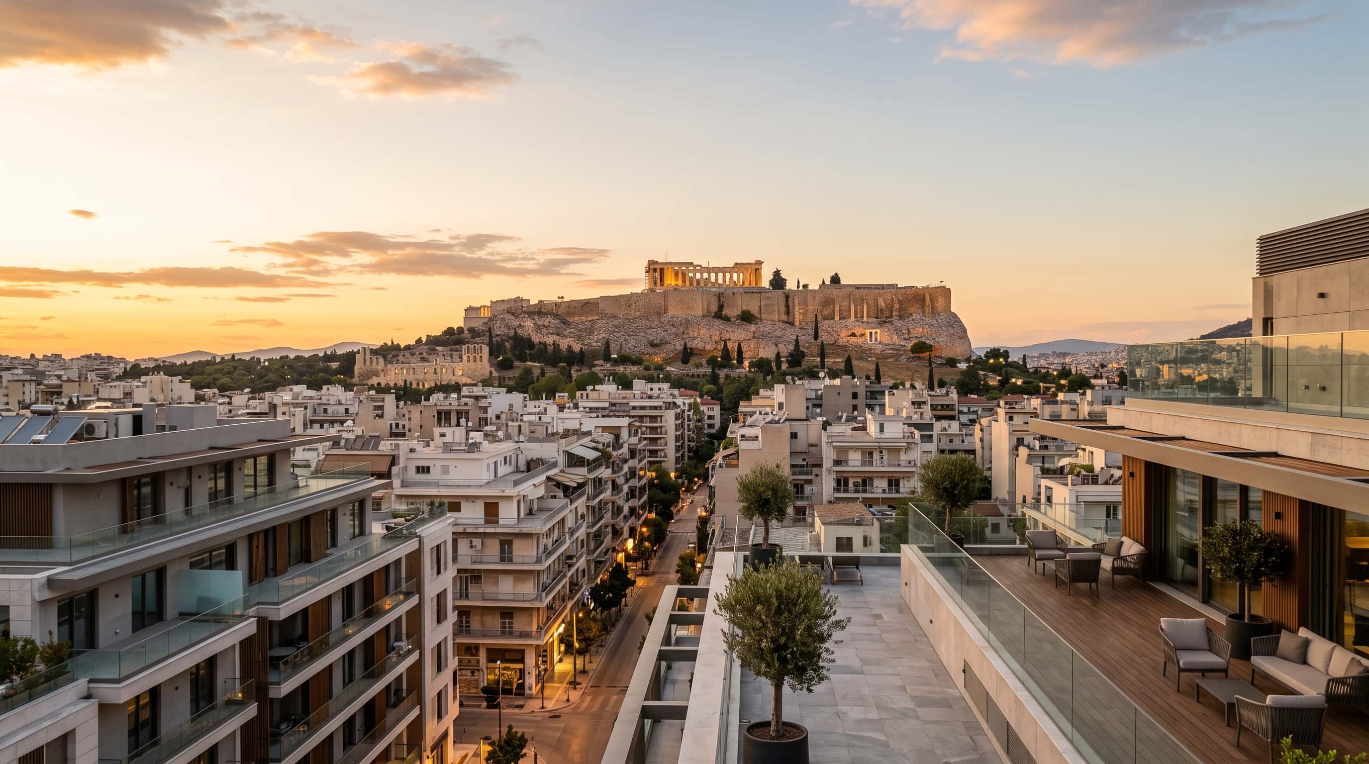 Athens skyline with the Acropolis at golden hour above modern residences
